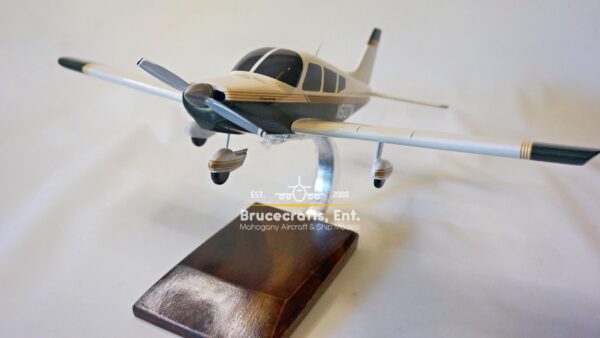 Model of Piper PA-28 Cherokee with detailed craftsmanship.